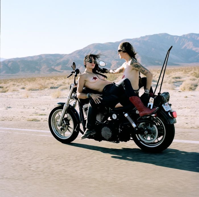 Girls on a motorcycle in Yongyin